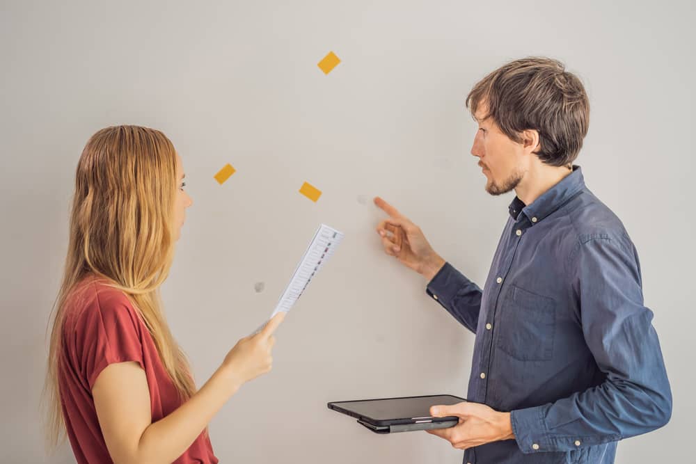 The realtor checks the condition of the apartment when the tenants are about to move out. The walls were damaged, you need to pay for them or deduct part of the money from the deposit