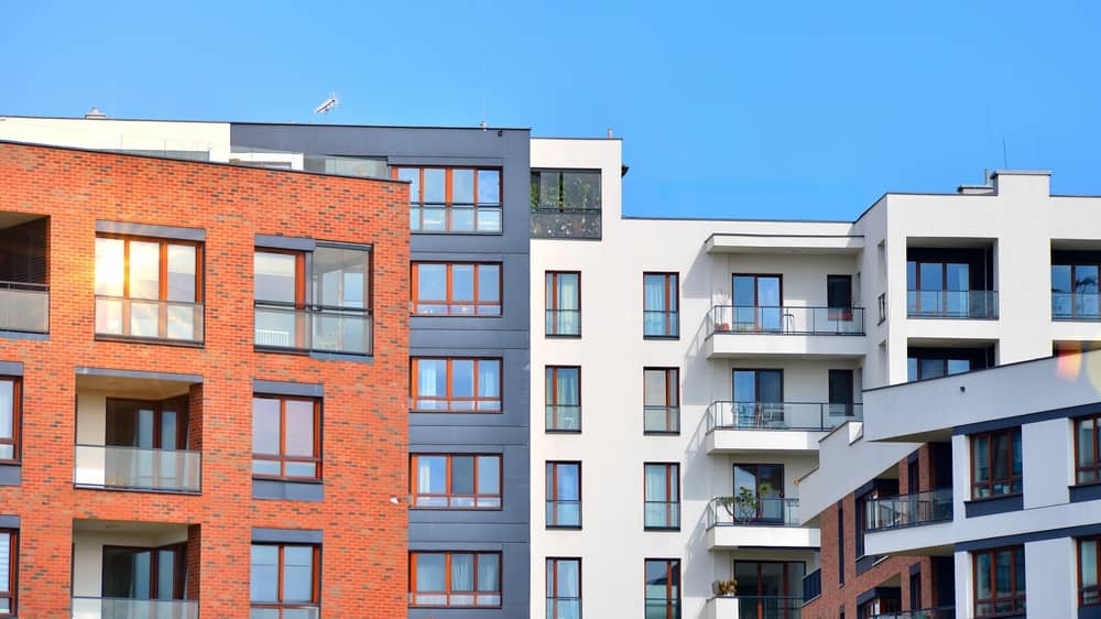 Apartments in residential complex. Housing structure at modern house.  Architecture for property investment. and architecture details. Urban abstract - windows of apartment building.