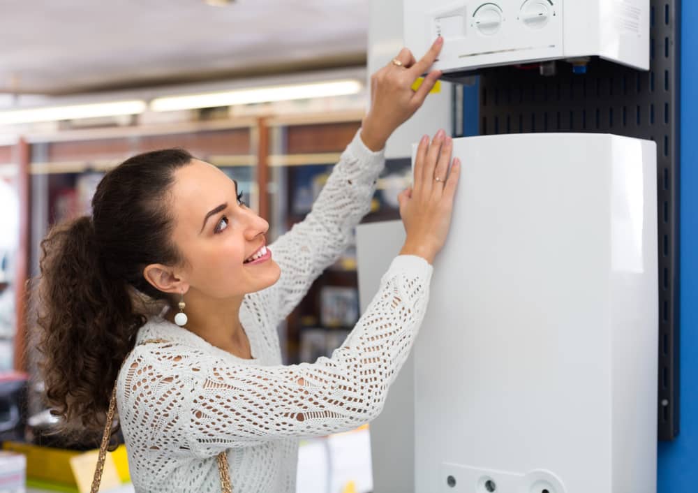 Boiler tech demonstrating a boiler juts like the article explaining boiler issues for BTL landlords