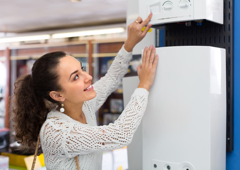 Boiler tech demonstrating a boiler juts like the article explaining boiler issues for BTL landlords