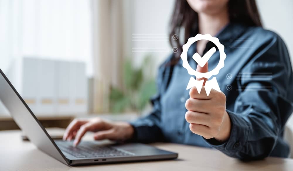 A landlord thumbs up happy she gets rent guarantee